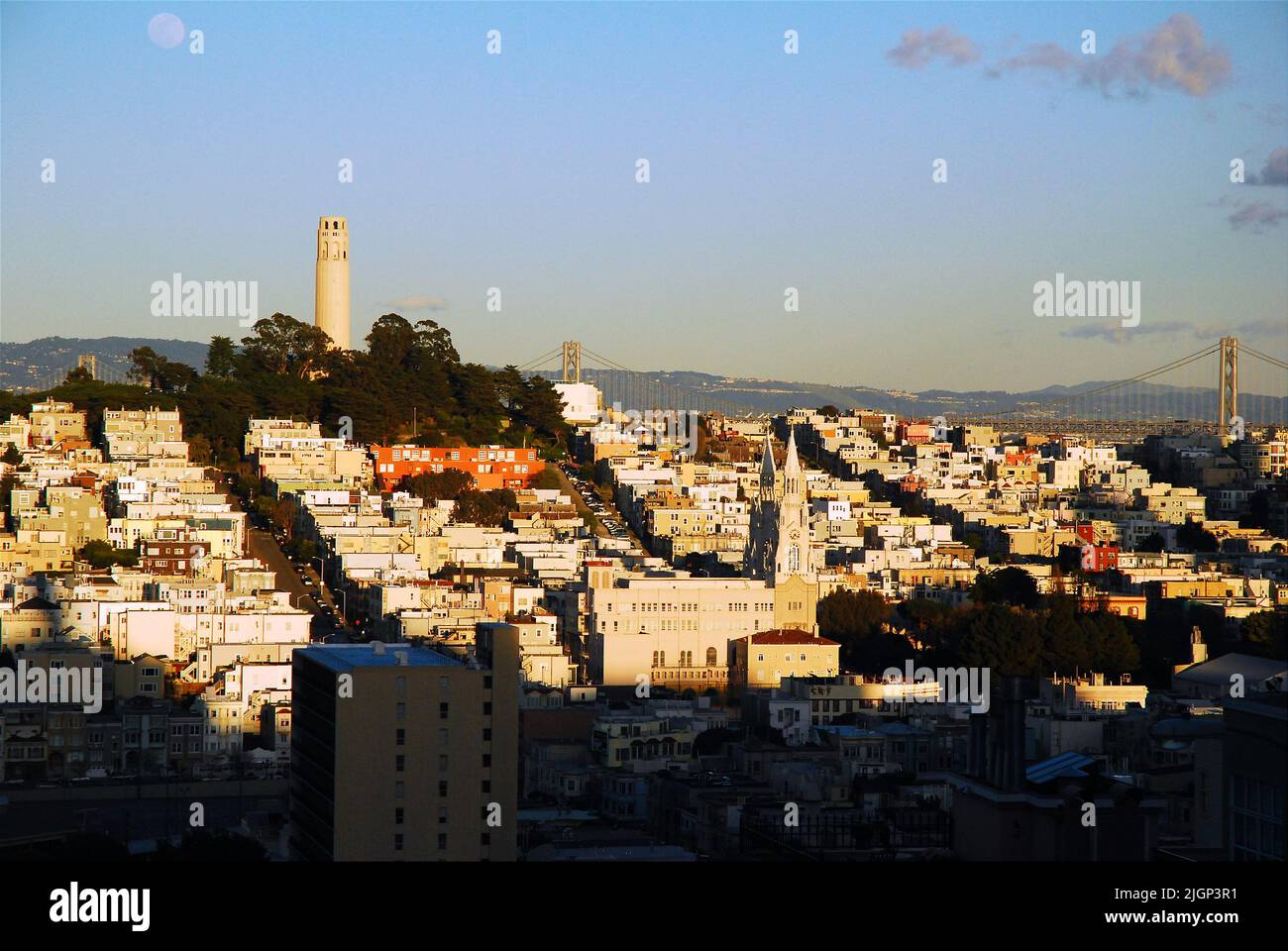 The top of Russian Hill gives a view of the Coit Tower and the neighborhoods and community of San Francisco Stock Photo