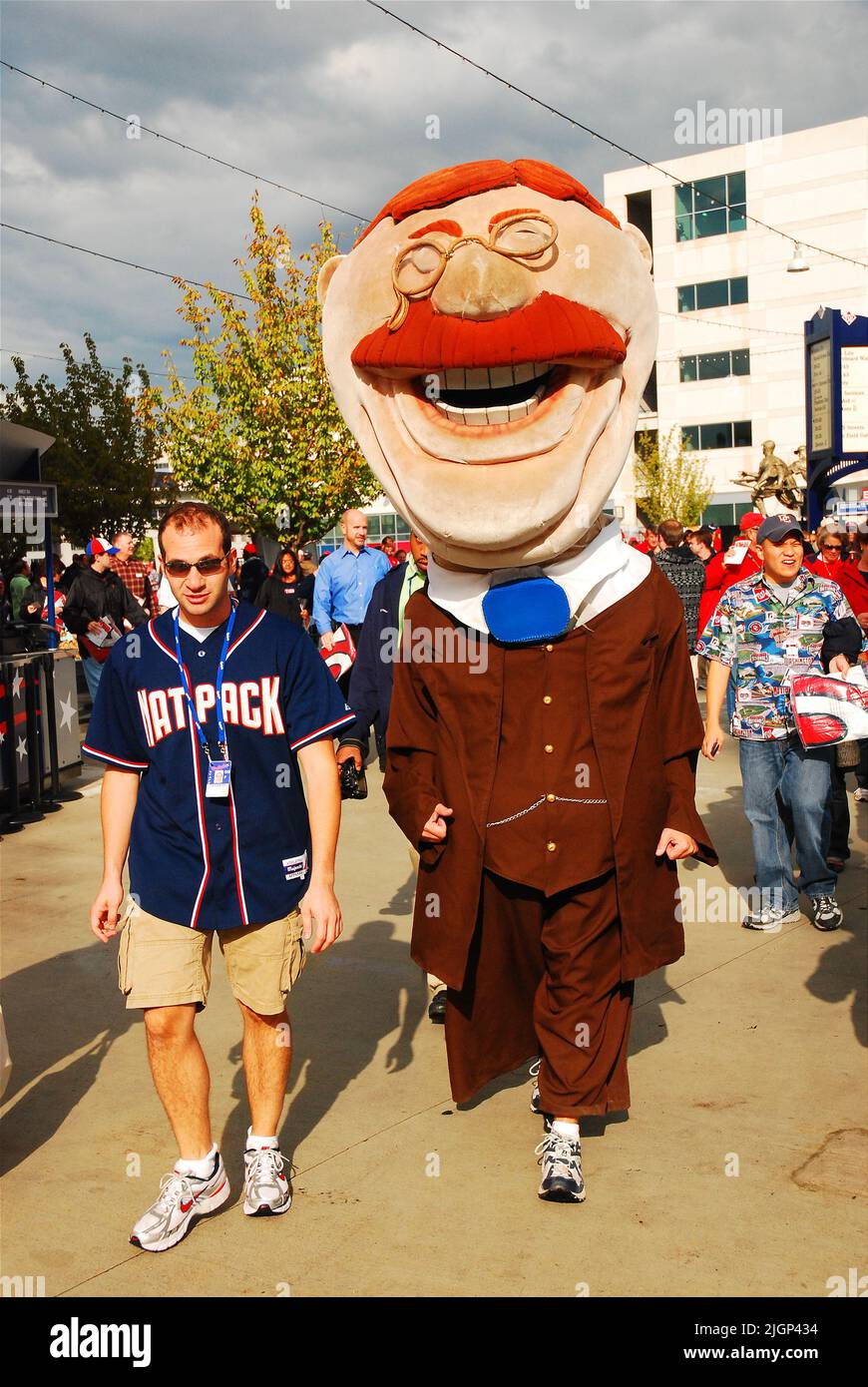 A large Caricature Teddy Roosevelt, one of the Presidents that walk through Washington Nationals Park during a baseball game, greets fans of the team Stock Photo