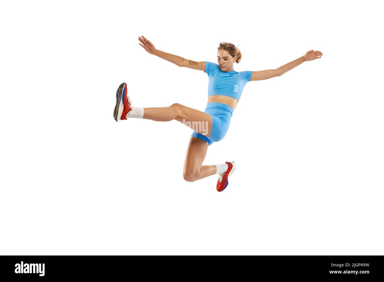 triple-jump-technique-studio-shot-of-female-athlete-in-sports-uniform
