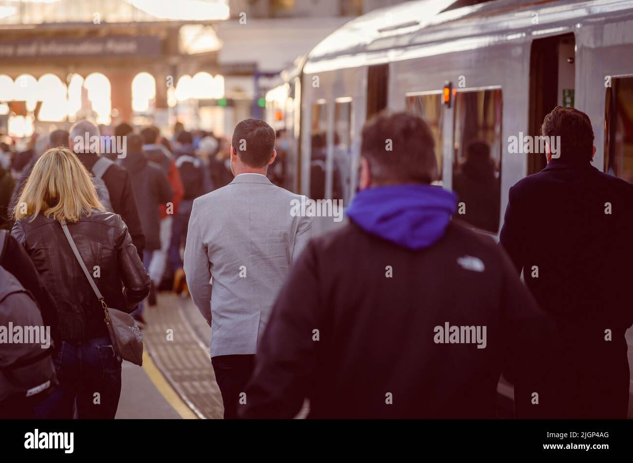 Crowded platform at Brighton Railway Station during the morning rush hour, Brighton, England. Stock Photo