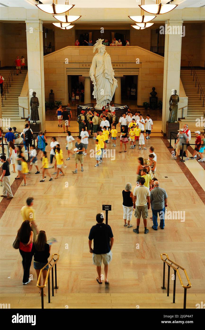 People crowd the United States Capitol Visitors Center, buying tickets to tour the government building holding the Senate and House of Representatives Stock Photo