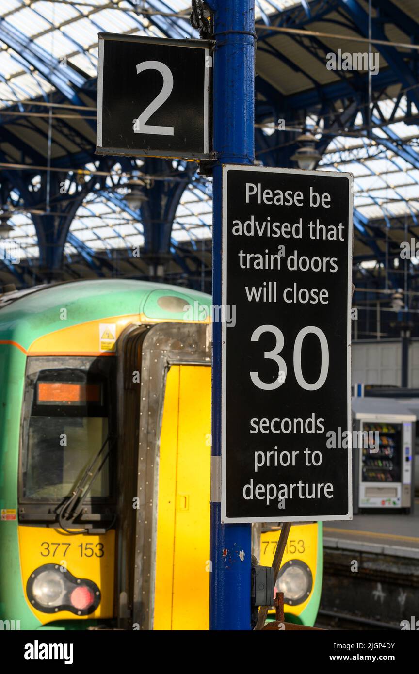 Platform sign at a Brighton Railway Station, England. Stock Photo