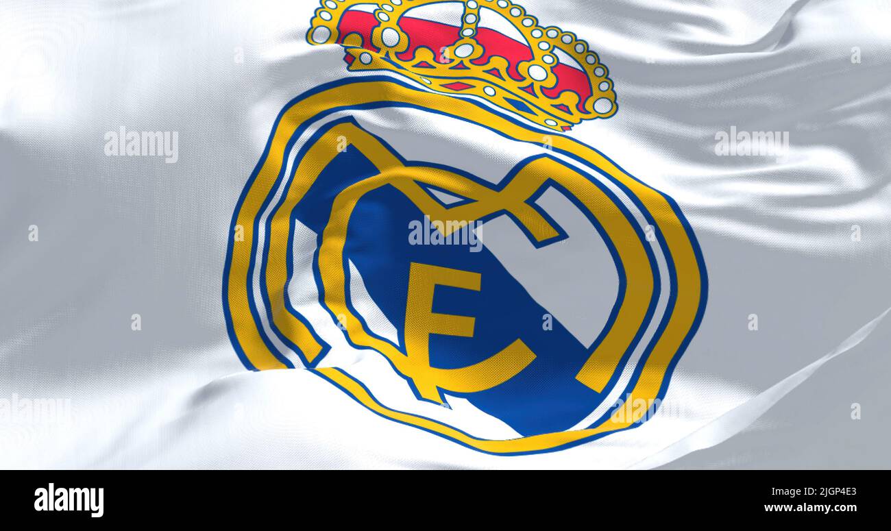 Madrid, Spain, May 2022: The flag of Real Madrid Club de Futbol waving in the wind on a clear day. Real Madrid C.F. is a Spanish professional football Stock Photo