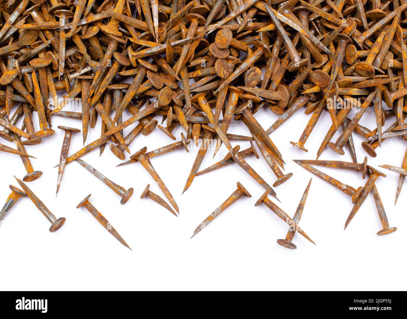 Rusty square cut carpentry nails on white Stock Photo Alamy