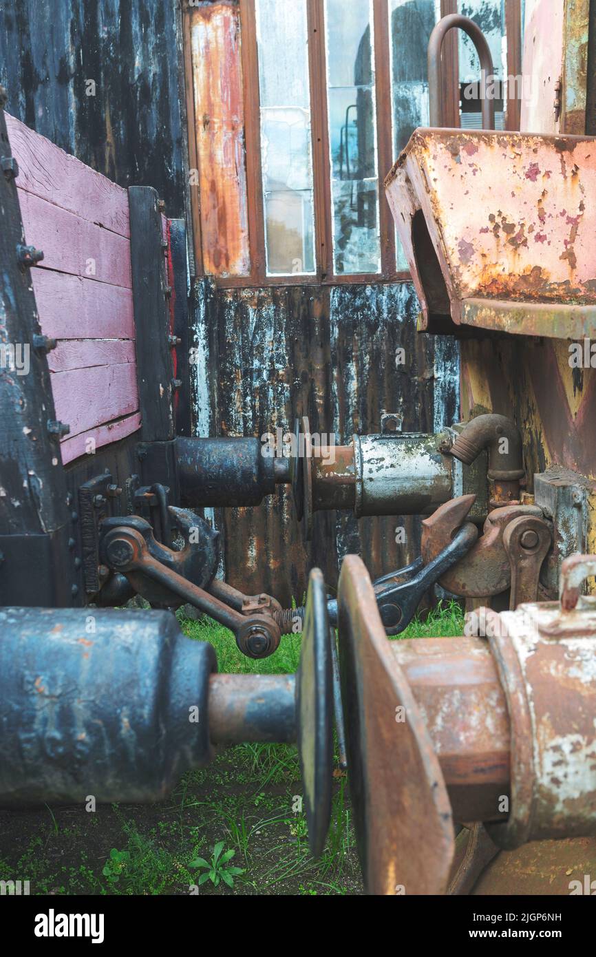 Old rusty iron coupling between two train carriages. Wagon buffers. Stock Photo
