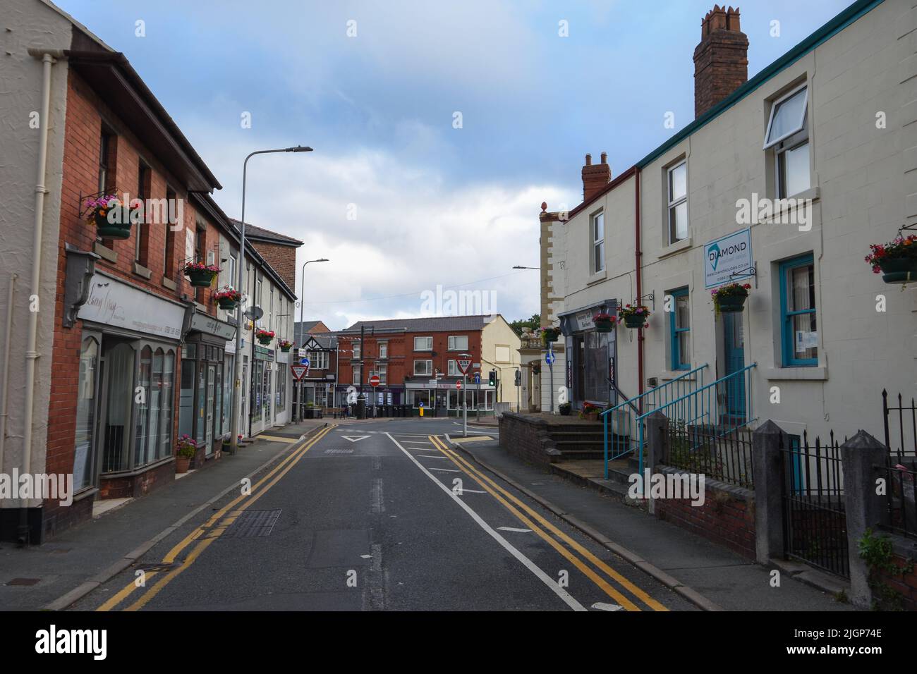 Holywell, UK: Jun 19, 2022: A general street scene view of Brynford Street, looking towards Victoria Place in the Welsh market town of Holywell, a pla Stock Photo