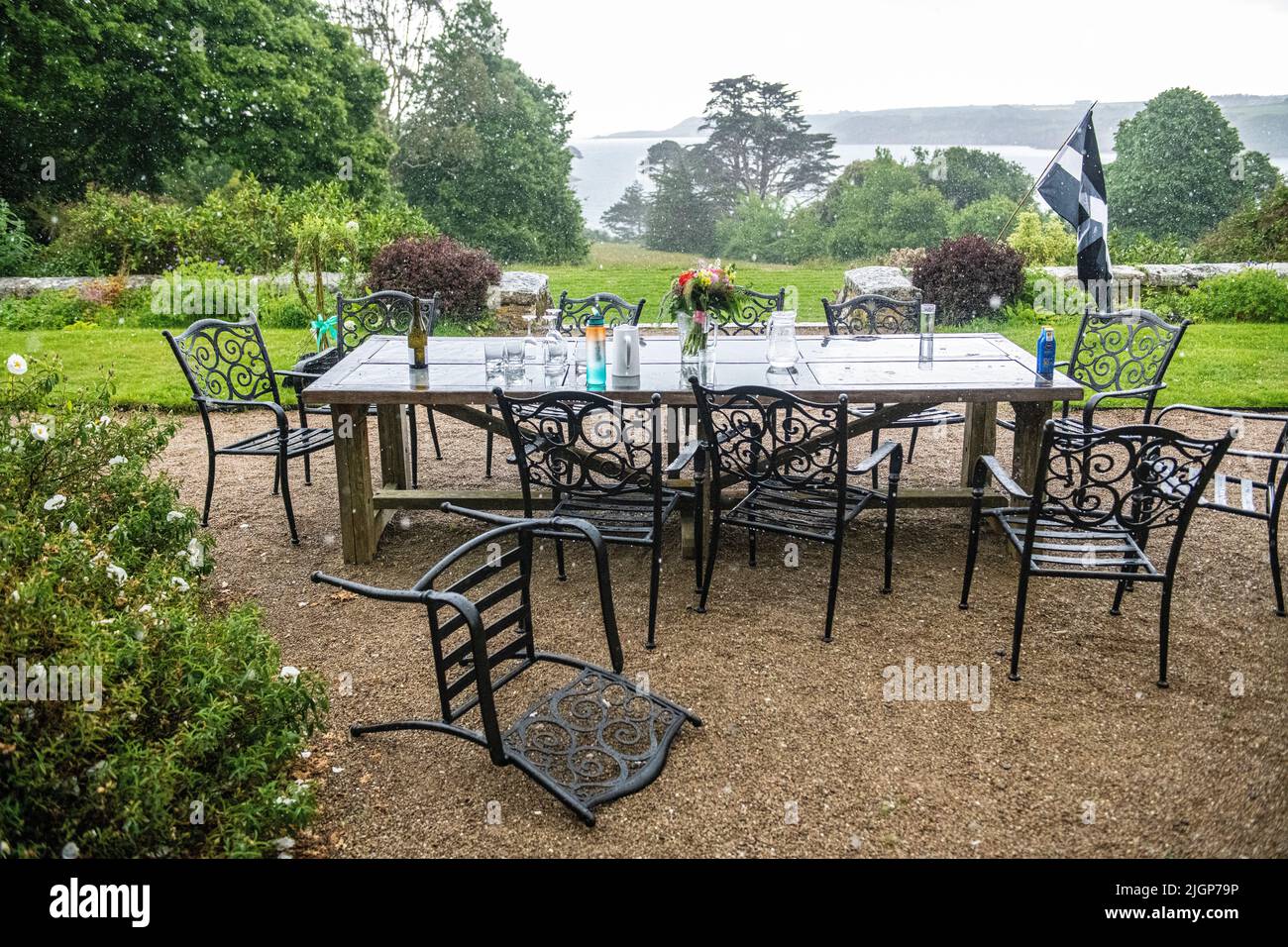An abandoned picnic because of heavy rain in the west country Stock Photo