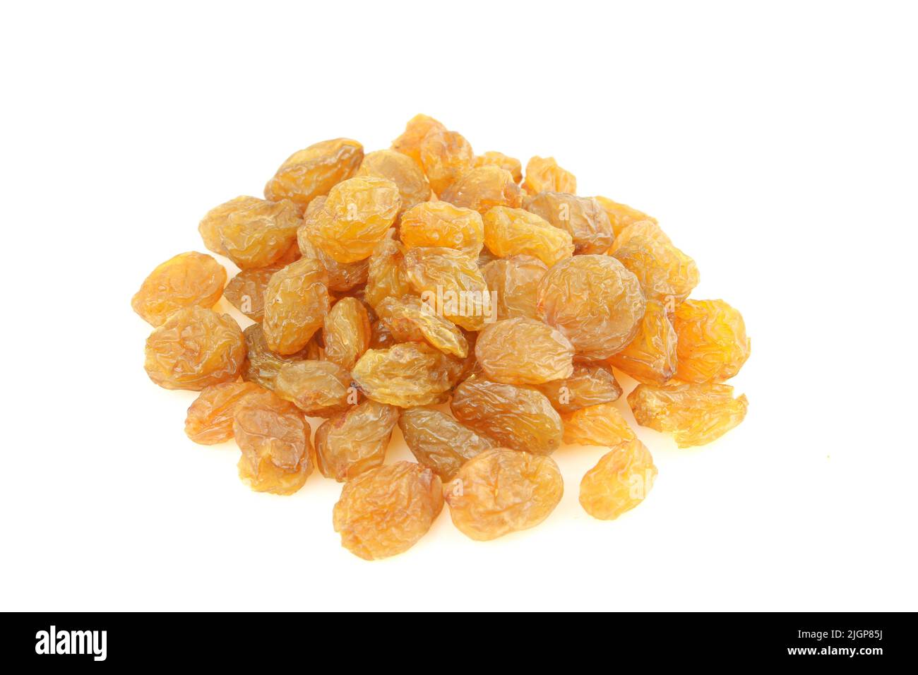 Pile of bright yellow raisins. Dry grapes isolated on white background