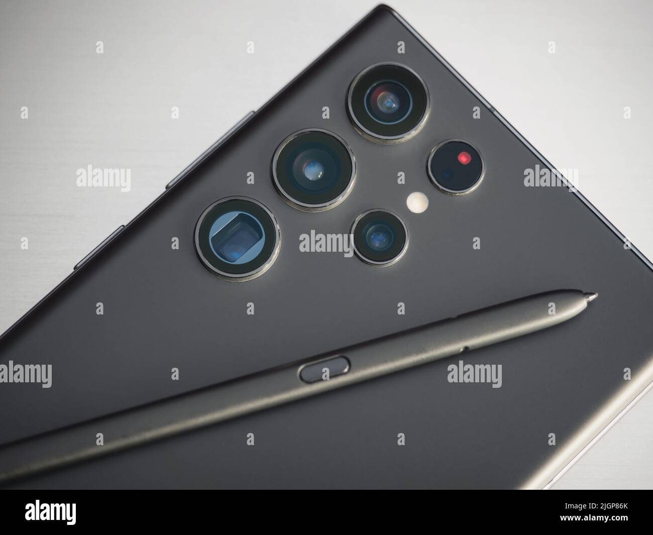 Galati, Romania: June 29, 2022: The new Samsung Galaxy S22 Ultra back with camera lenses and SPen on grey background Stock Photo