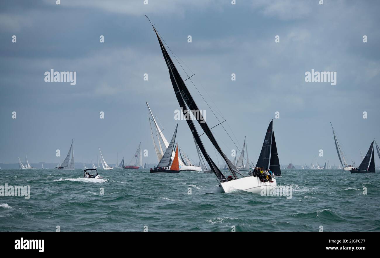 A great day to be on the water in The Solent during the very busy Isle of Wight Round The Island yacht race on the South coast of England Stock Photo