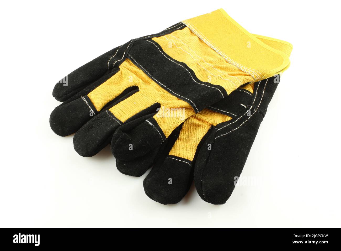 Black and yellow working gloves isolated on white background. Safety work wear Stock Photo
