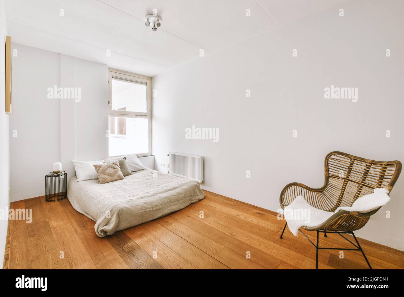 Home interior design of bedroom with bed near window in modern ...