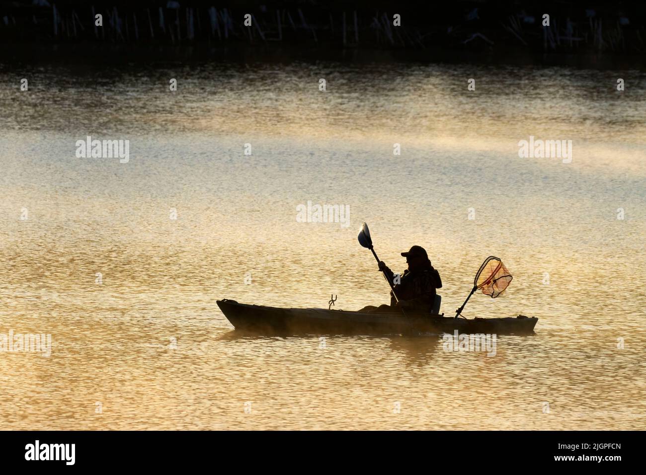 Fishing from kayak on South Twin Lake, Deschutes National Forest