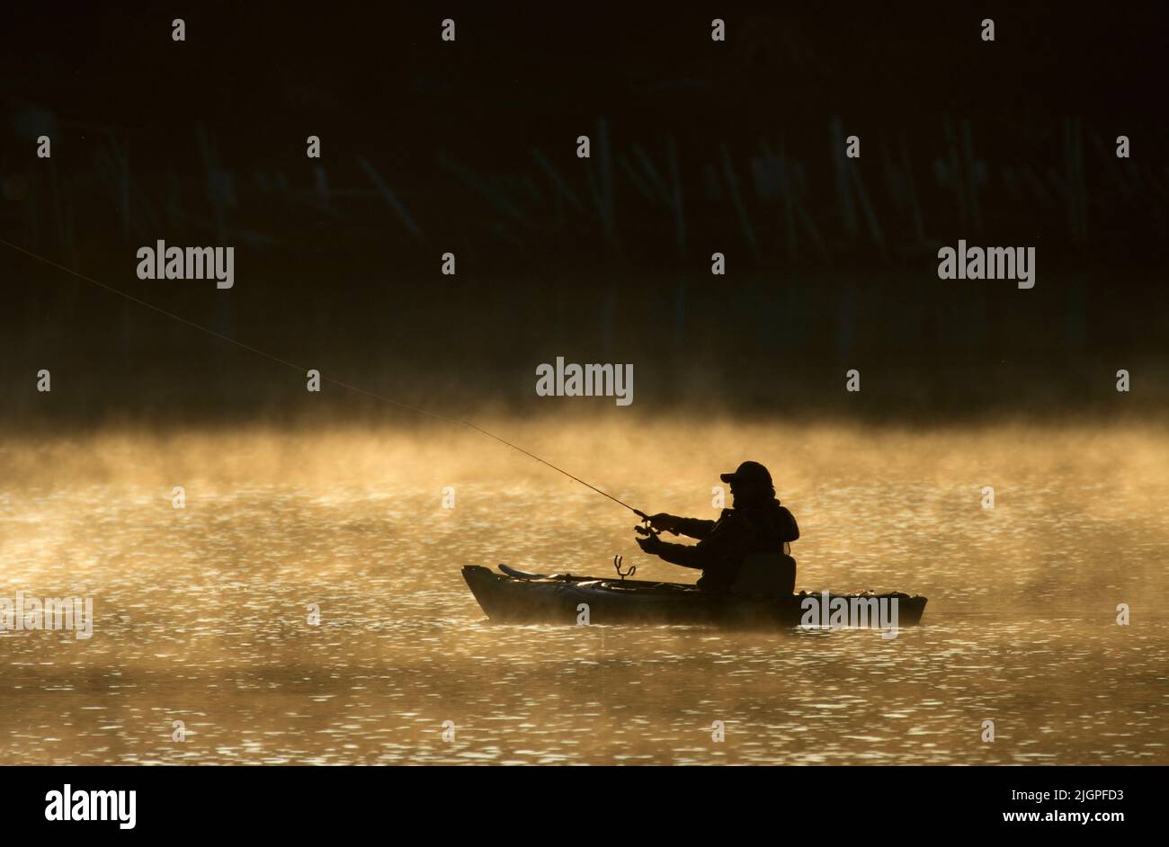 Fishing from kayak on South Twin Lake, Deschutes National Forest