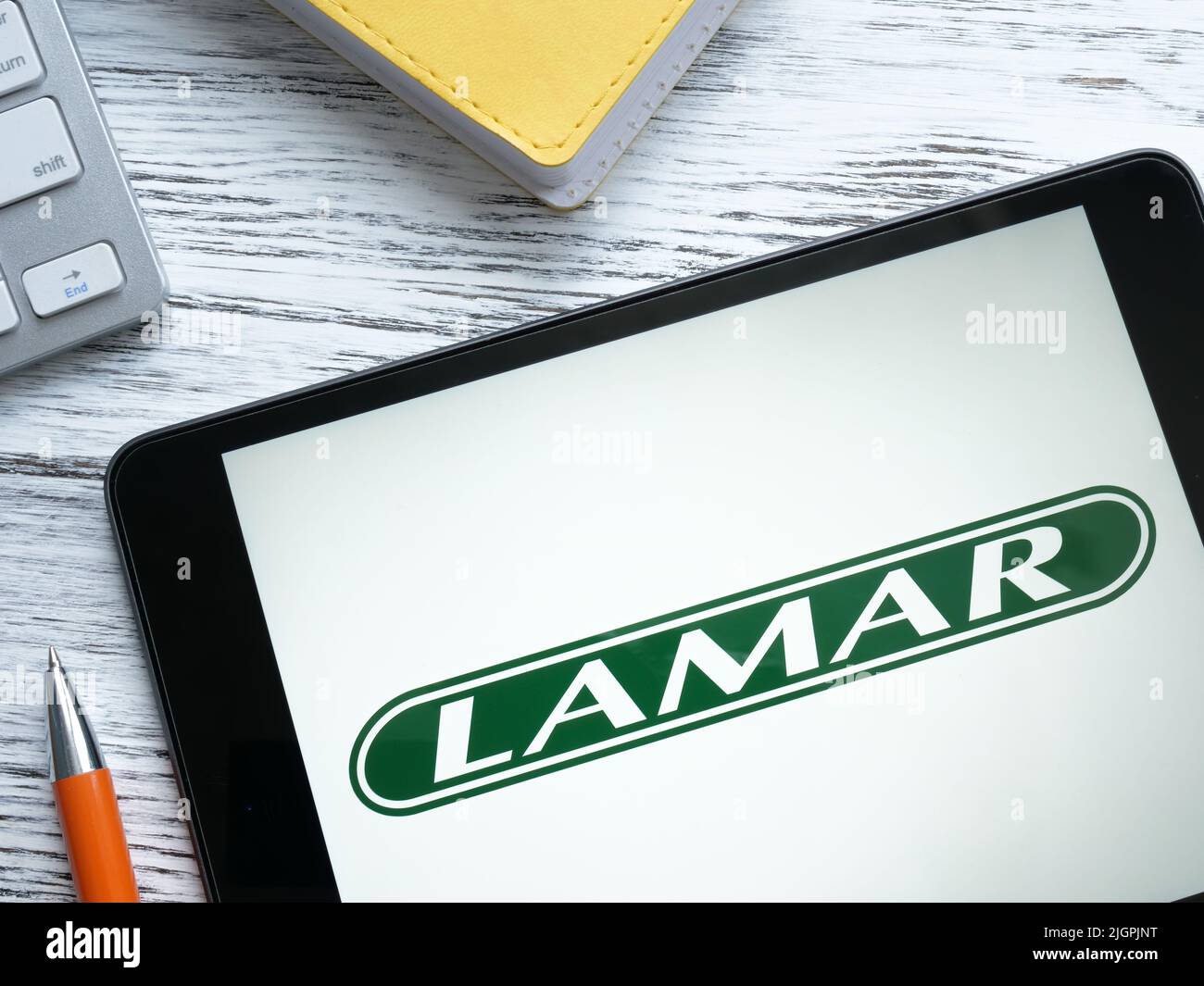 KYIV, UKRAINE - July 06, 2022. Lamar Advertising Company logo on the screen. Stock Photo