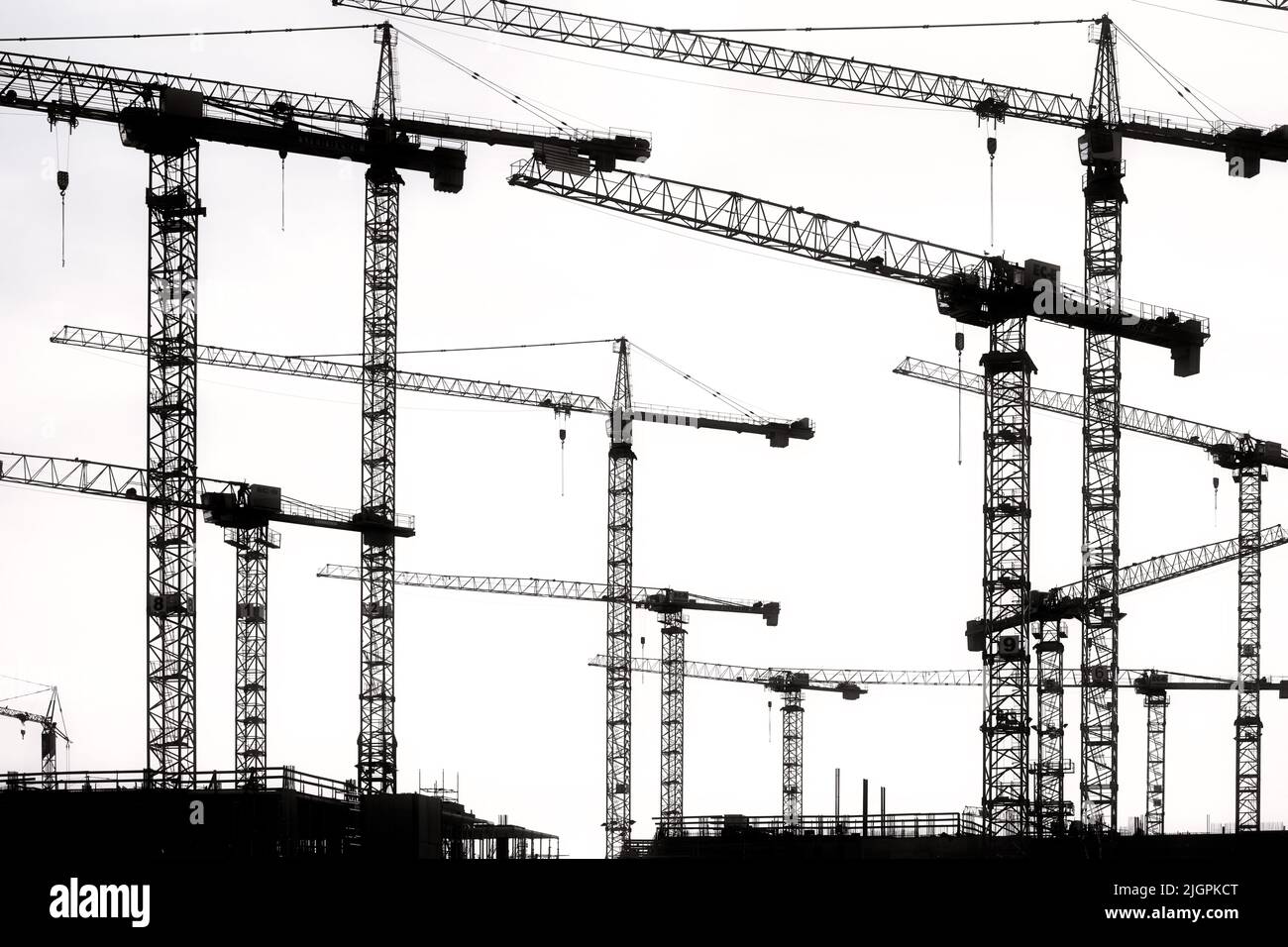Construction Cranes In The Harbour City Of Hamburg, Germany Stock Photo