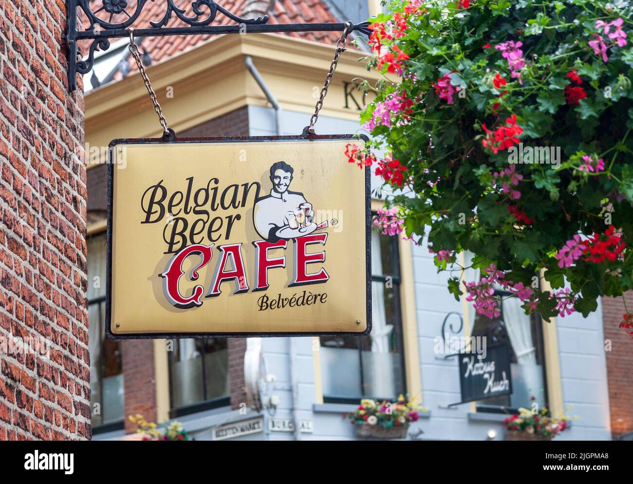 Belgian beer cafe retro outdoor wall sign with logo in the old town of Delft, Netherlands Stock Photo