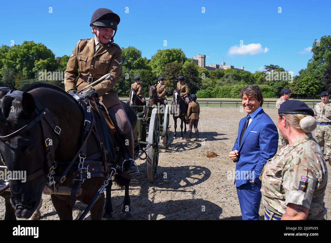 Windsor Castle, Windsor, Berkshire, UK. 8th July 2022. EMBARGOED UNTIL 12th JULY  Tom Cruise meeting members of the King's Troop Royal Horse Artillery, who he introduced during the Platinum Jubilee Celebration back in May, on a private visit in the Private Grounds of Windsor Castle   Credit:Peter Nixon/Alamy Live News Stock Photo