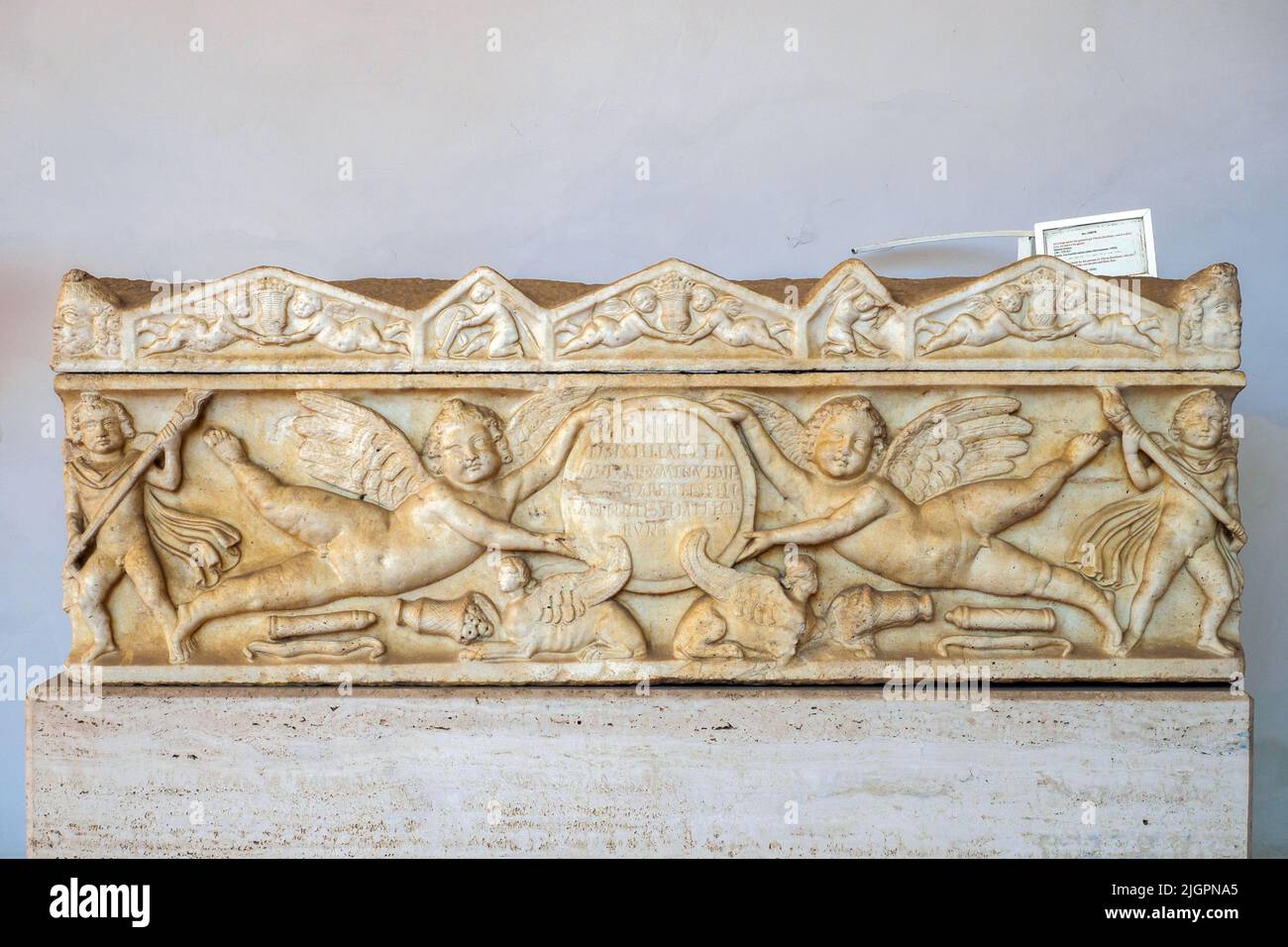 Sarcophagus made by the parents of Flavia Sextiliae, who died at the age of ten years, six months and three days. White marble. 120-150 AD - Rome, Via Aurelia Antica - National Roman Museum - The Baths of Diocletian - Rome, Italy Stock Photo