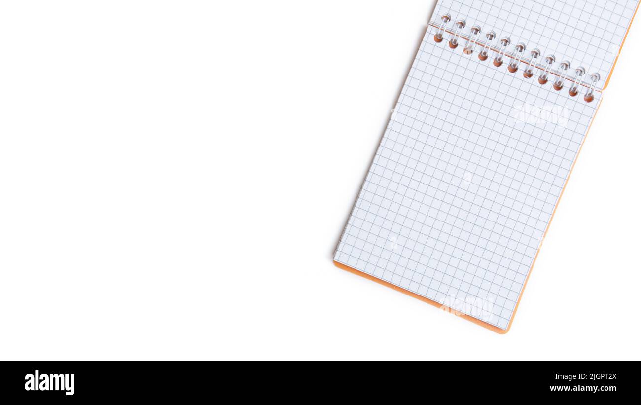 Blank notepad with wire binding isolated on a white background. Top ...