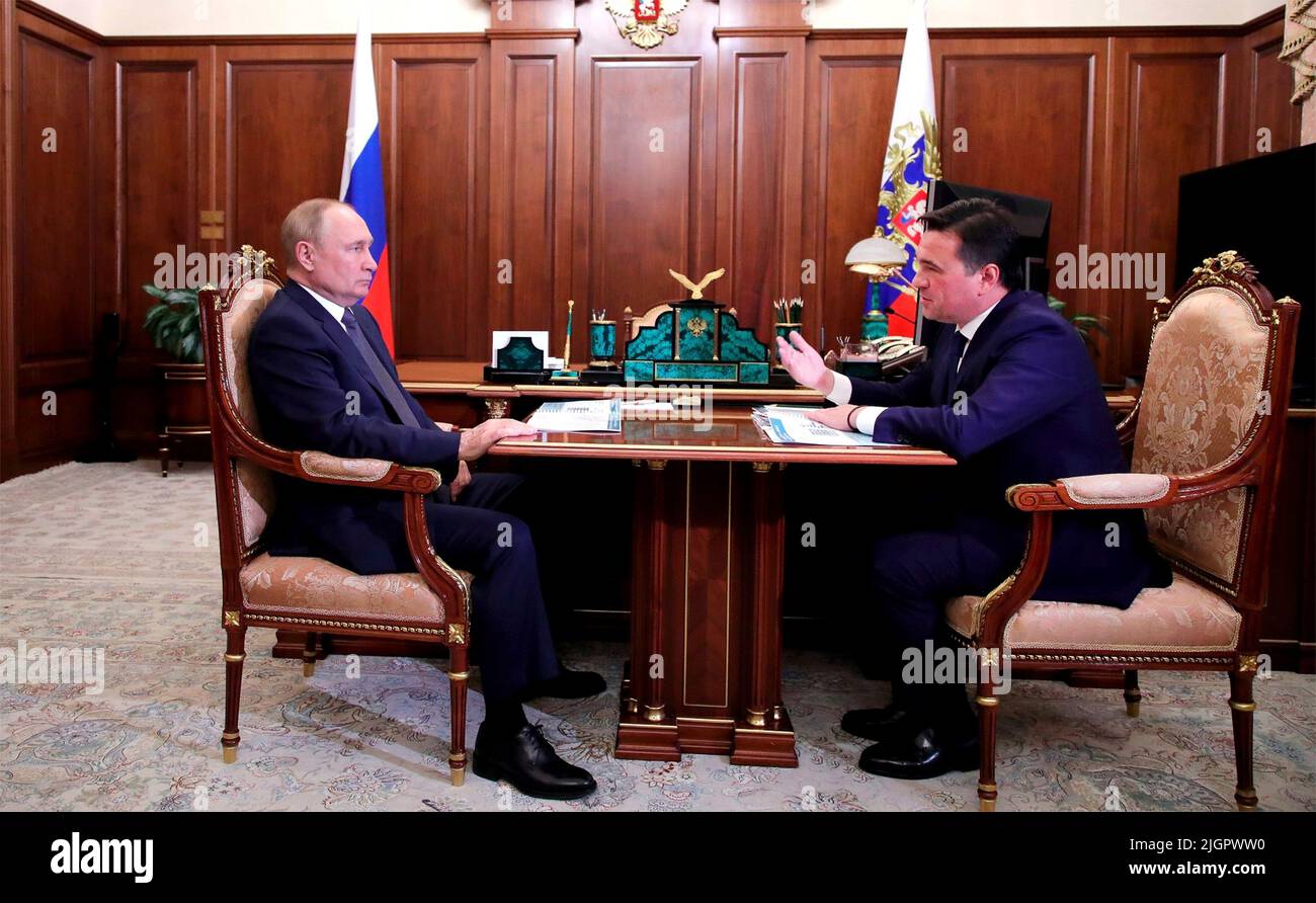 Moscow, Russia. 11th July, 2022. Russian President Vladimir Putin holds a face-to-face meeting with Moscow Regional Governor Andrei Vorobyov on the economic situation, right, at the Kremlin, July 11, 2022 in Moscow, Russia. Credit: Mikhail Klimentyev/Kremlin Pool/Alamy Live News Stock Photo