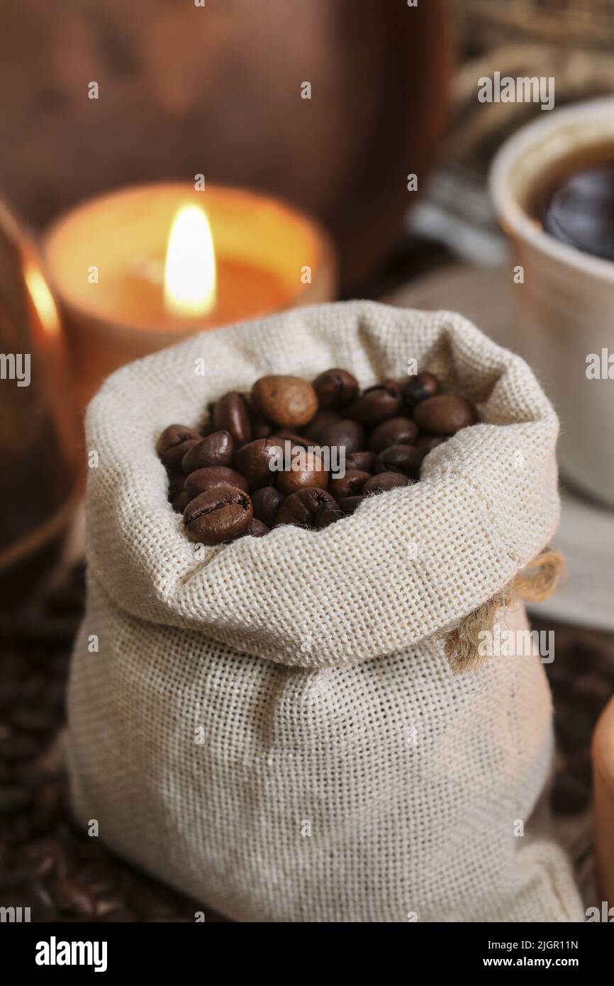 Jute sack full of coffee grains. Party time Stock Photo