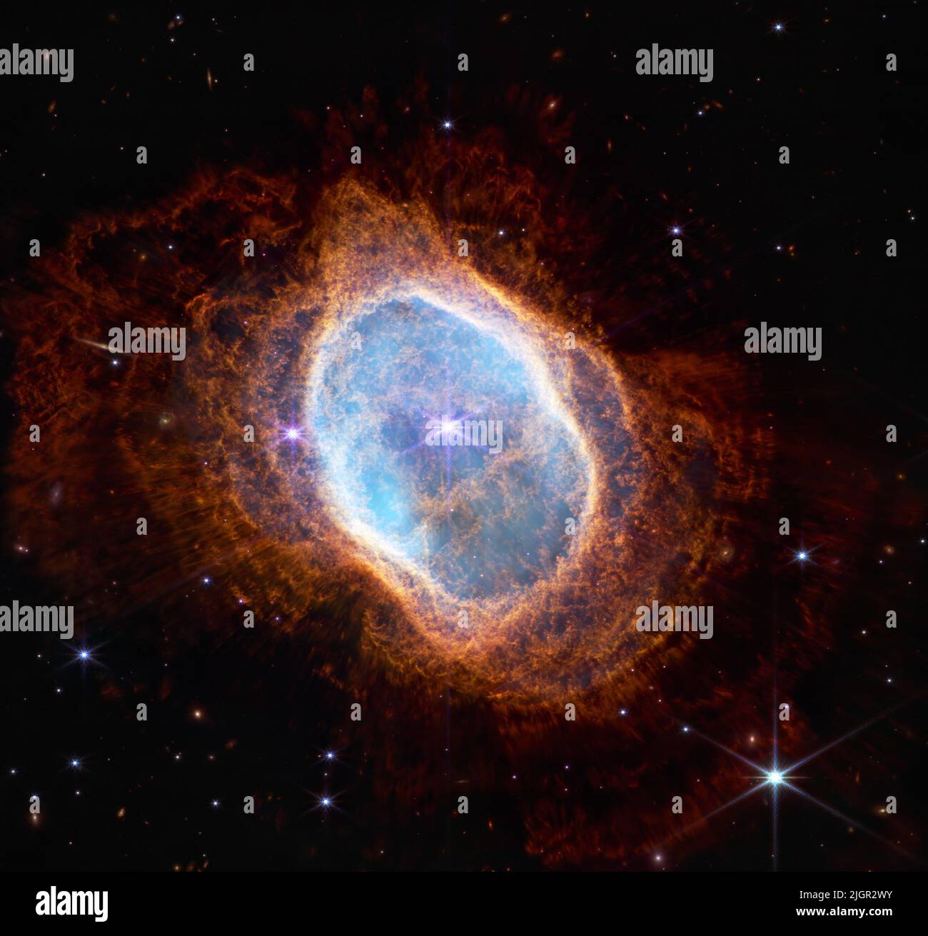 Greenbelt, United States Of America. 12th July, 2022. Greenbelt, United States of America. 12 July, 2022. The first group of photos captured by the NASA Webb Telescope shows the Southern Ring Nebula in near-infrared light, released from Goddard Space Flight Center July 12, 2022 in Greenbelt, Maryland. This scene was created by a white dwarf star - the remains of a star like our Sun after it shed its outer layers and stopped burning fuel though nuclear fusion. Those outer layers now form the ejected shells all along this view. Credit: NASA/JPL-Caltech/NASA, ESA, CSA, STScI/Alamy Live News Stock Photo