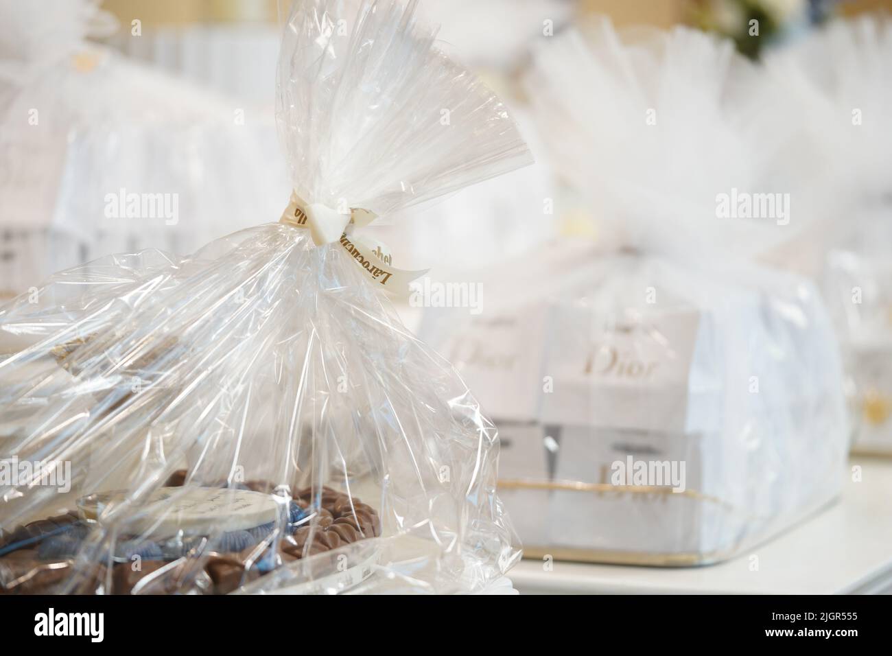 Wedding giveaway.Dior mini perfume goodie bag. Stock Photo