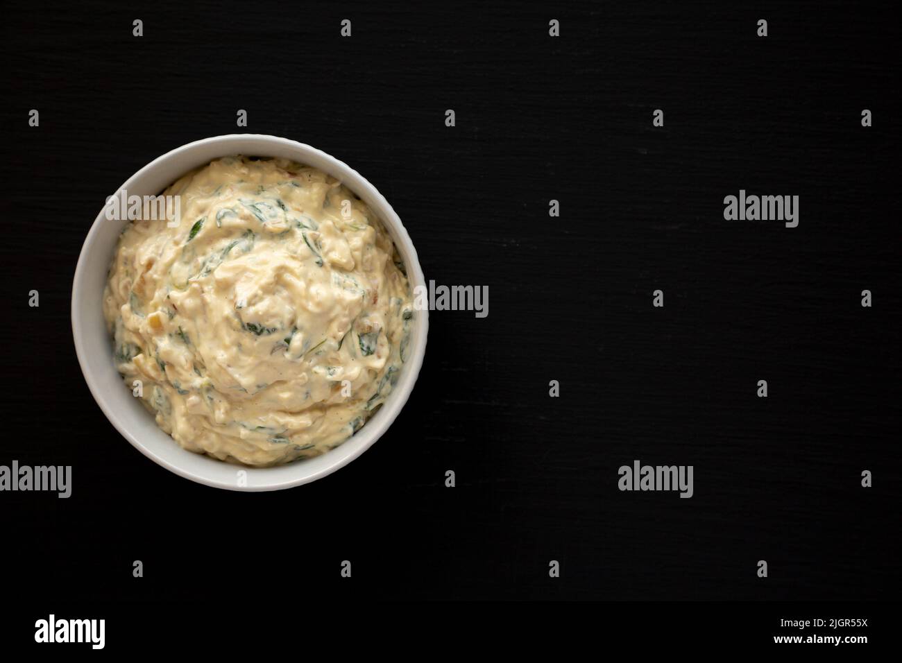 Homemade Caramelized Onion and Spinach Dip, top view. Flat lay ...