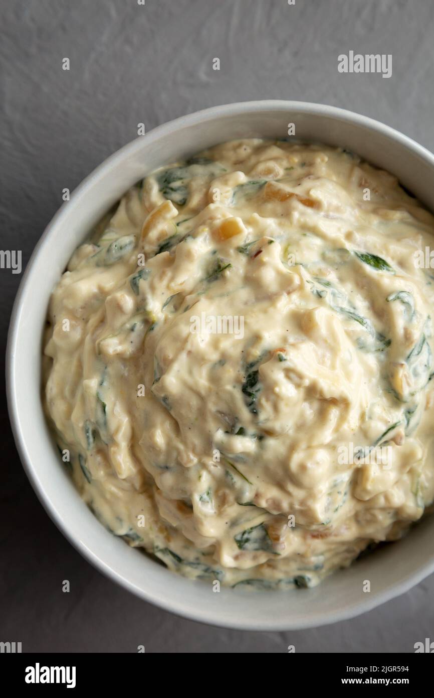 Homemade Caramelized Onion and Spinach Dip, top view. Flat lay ...