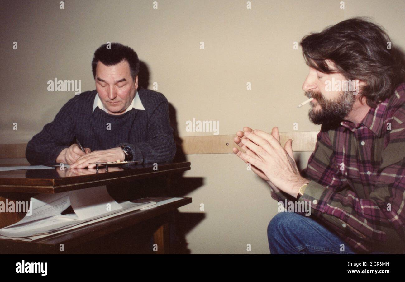 Bucharest, Romania, January 1990. The 'România Liberă' newspaper headquarters. Journalist Coman Sova & caricaturist  Eugen Mihaescu, visiting from the U.S.A. Stock Photo