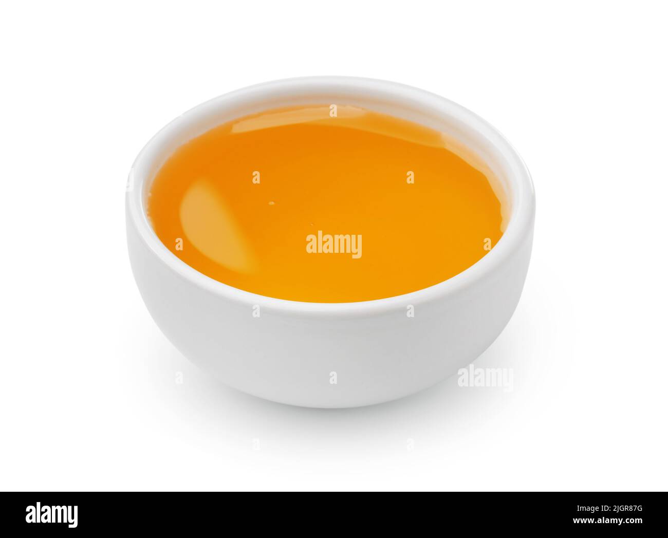 Ceramic bowl of fresh honey isolated on white Stock Photo