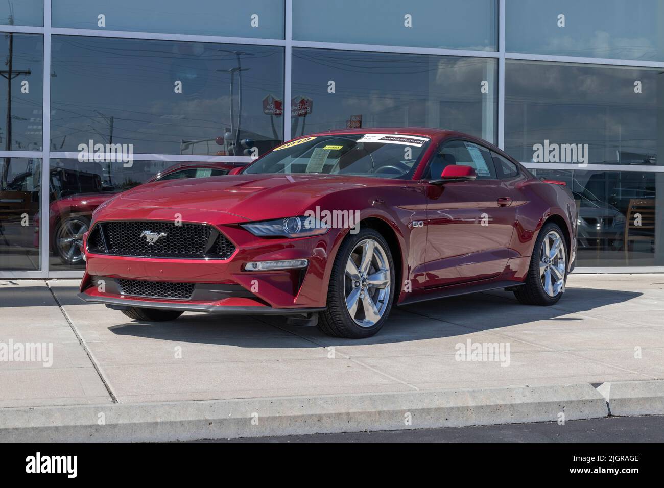 Harrison Circa July 2022 Used Ford Mustang display at a dealership. With supply issues, Ford
