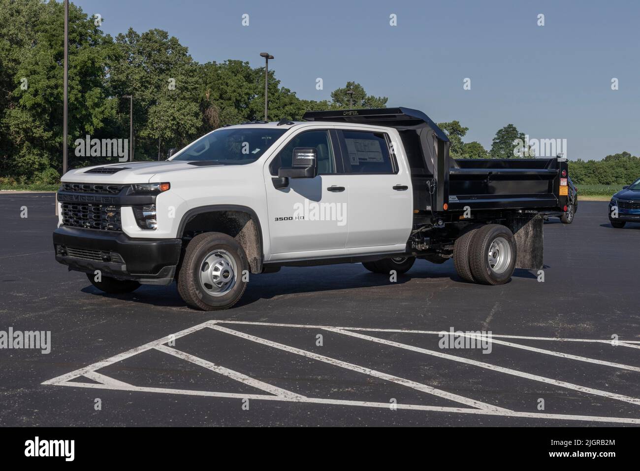 West Harrison - Circa July 2022: Chevrolet Silverado 3500HD Crew Cab Work Truck. Chevy offers the 3500 HD in a utility body, dump truck and stake body Stock Photo