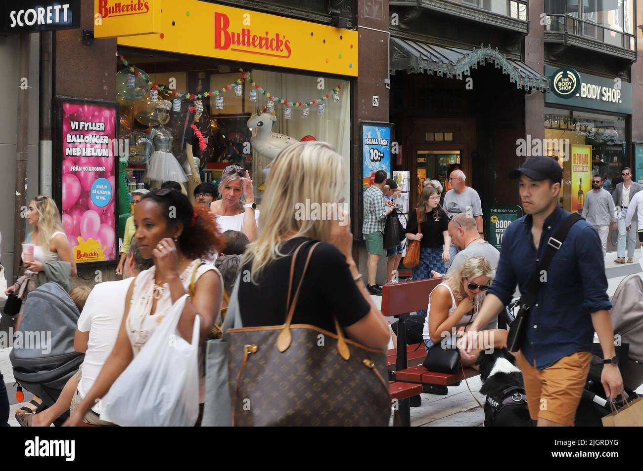 Stockholm, Sweden - July 12, 2022: View of the busy crowded Drottinggatan shopping street in downtown Stockholm. Stock Photo