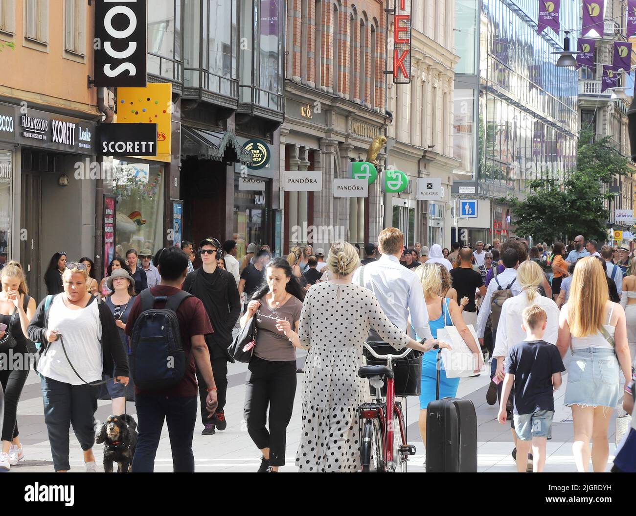 Stockholm, Sweden - July 12, 2022: People at the pedestrian only Drottningatan street in the Stockholm downtown area. Stock Photo