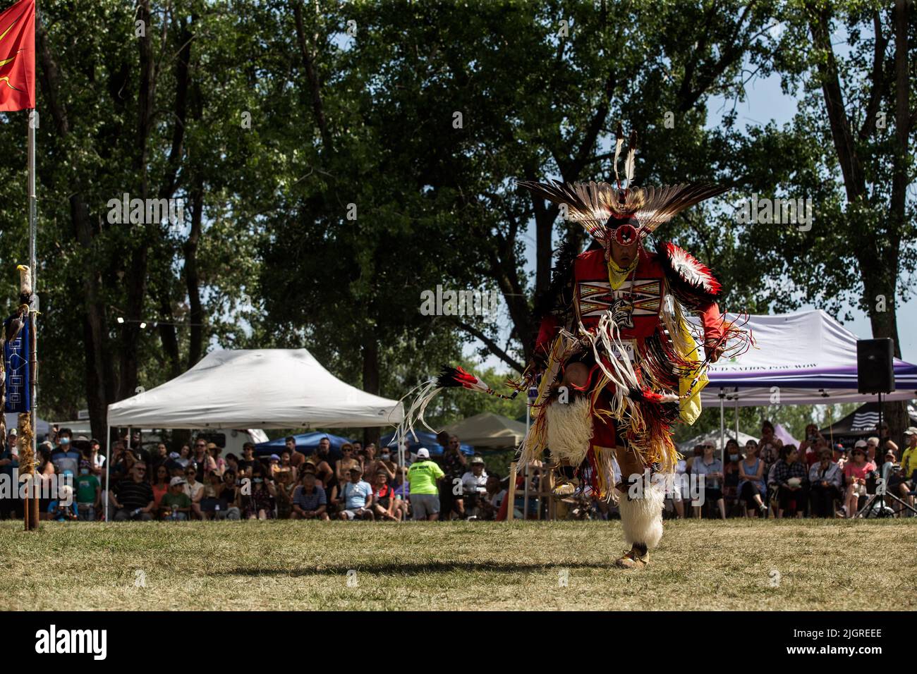 Kahnawake, Canada. 10th July, 2022. A powwow participant doing a