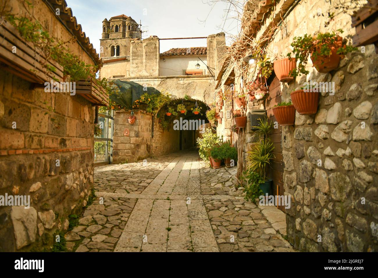 A narrow street among the old stone houses of the oldest district of Caserta, Italy Stock Photo