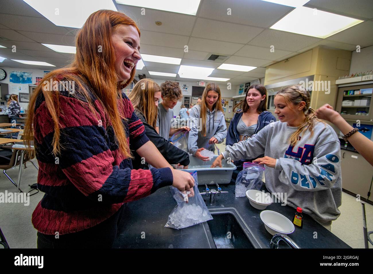 Using ice, salt and cream, high school girls make doityourself ice
