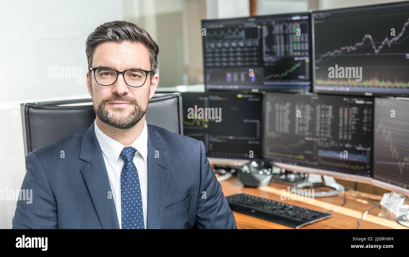 Business portrait of stock broker in traiding office. Stock Photo