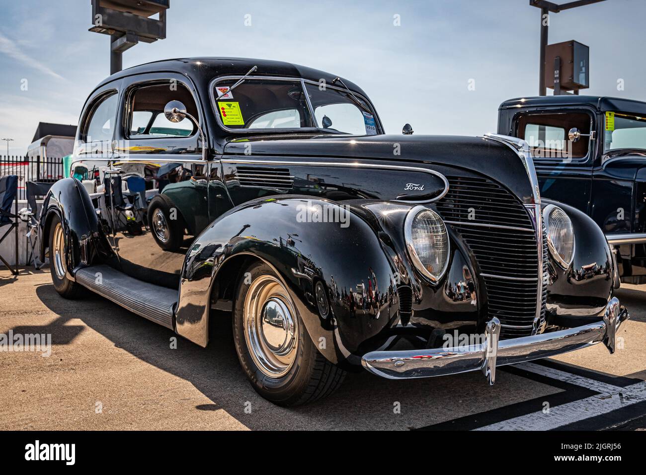 Lebanon, TN - May 14, 2022: Low perspective front corner view of a 1939 Ford Standard Tudor Sedan at a local car show. Stock Photo