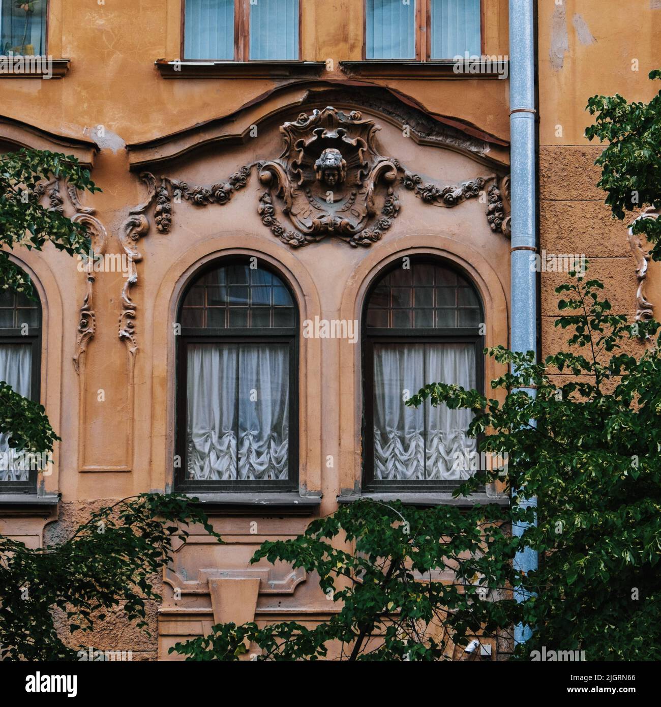 A closeup shot of the windows of a building with an interesting ...