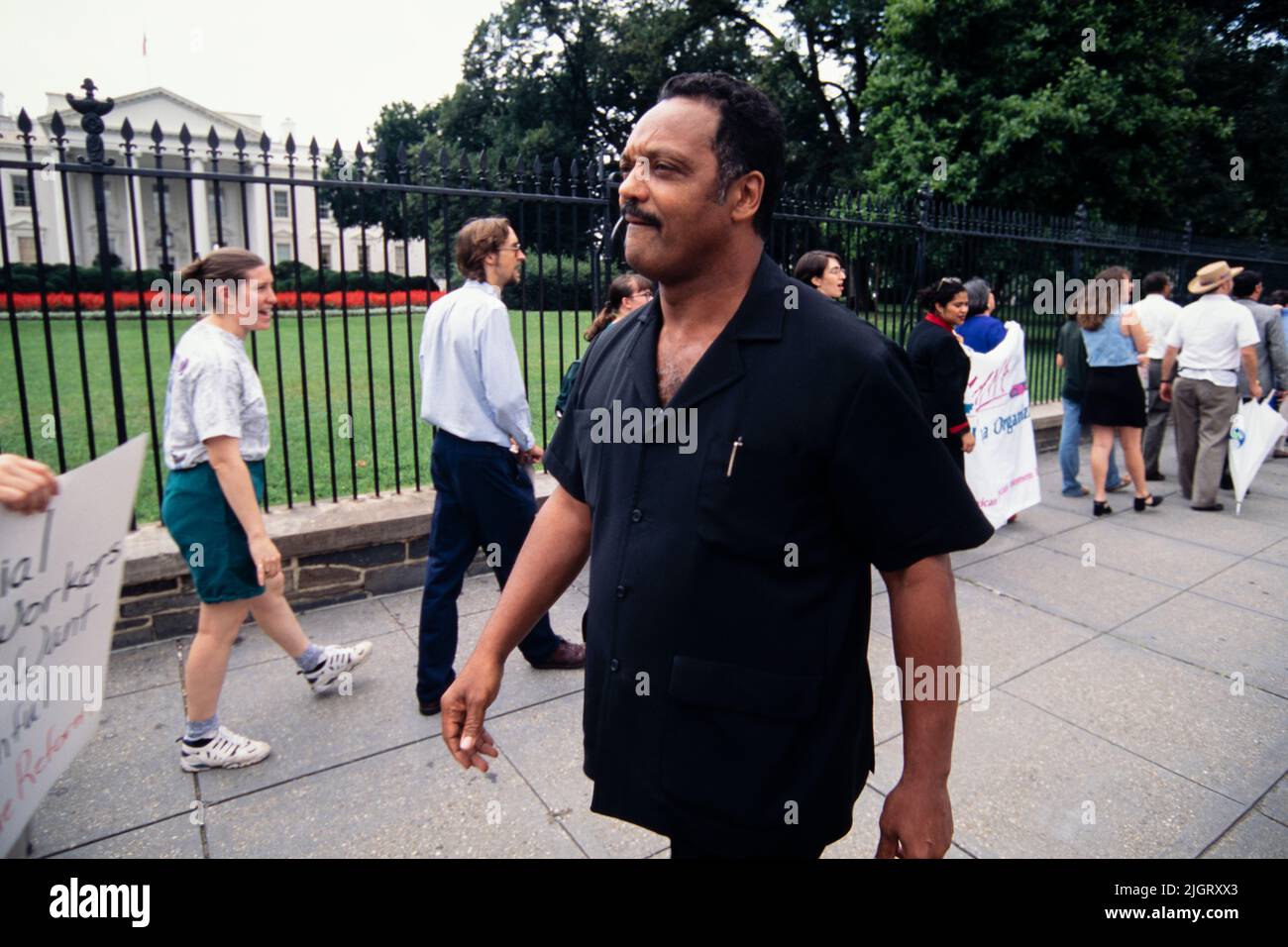 The Rev. Jesse Jackson, walks with protestors rallying against the Republican welfare reform plan outside the White House August 1, 1996 in Washington, D.C. Stock Photo