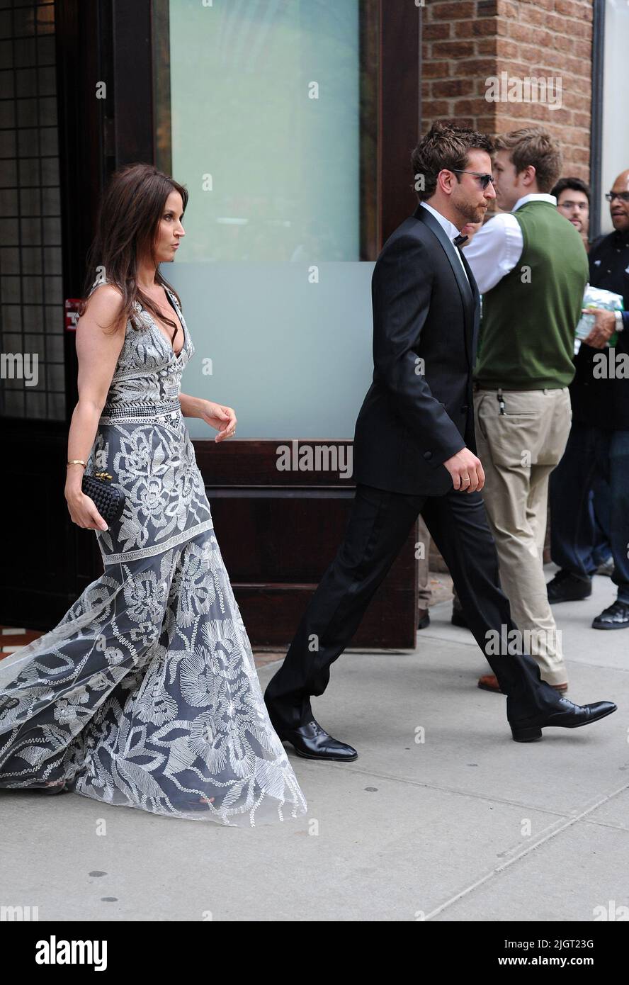 Manhattan, United States Of America. 02nd May, 2011. NEW YORK, NY - MAY 02: Bradley Cooper and Amanda Anka (daughter of singer Paul Anka and wife of Jason Bateman, who was present but not pictured) exit their downtown hotel en route to the Met Costume Gala 2011. on May 2, 2011 in New York City People: Bradley Cooper Amanda Anka Credit: Storms Media Group/Alamy Live News Stock Photo