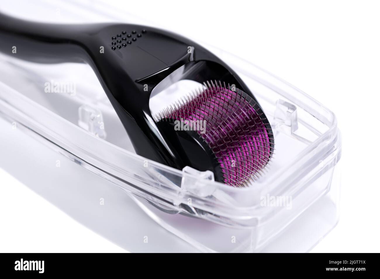 Derma roller mesoroller isolated on a white background. The device for cosmetic procedures of mesotherapy. Stock Photo