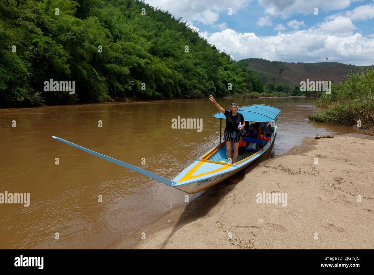 A boat trip along the MAE KOK river from Thaton to Chiang Rai  - THAILAND Stock Photo