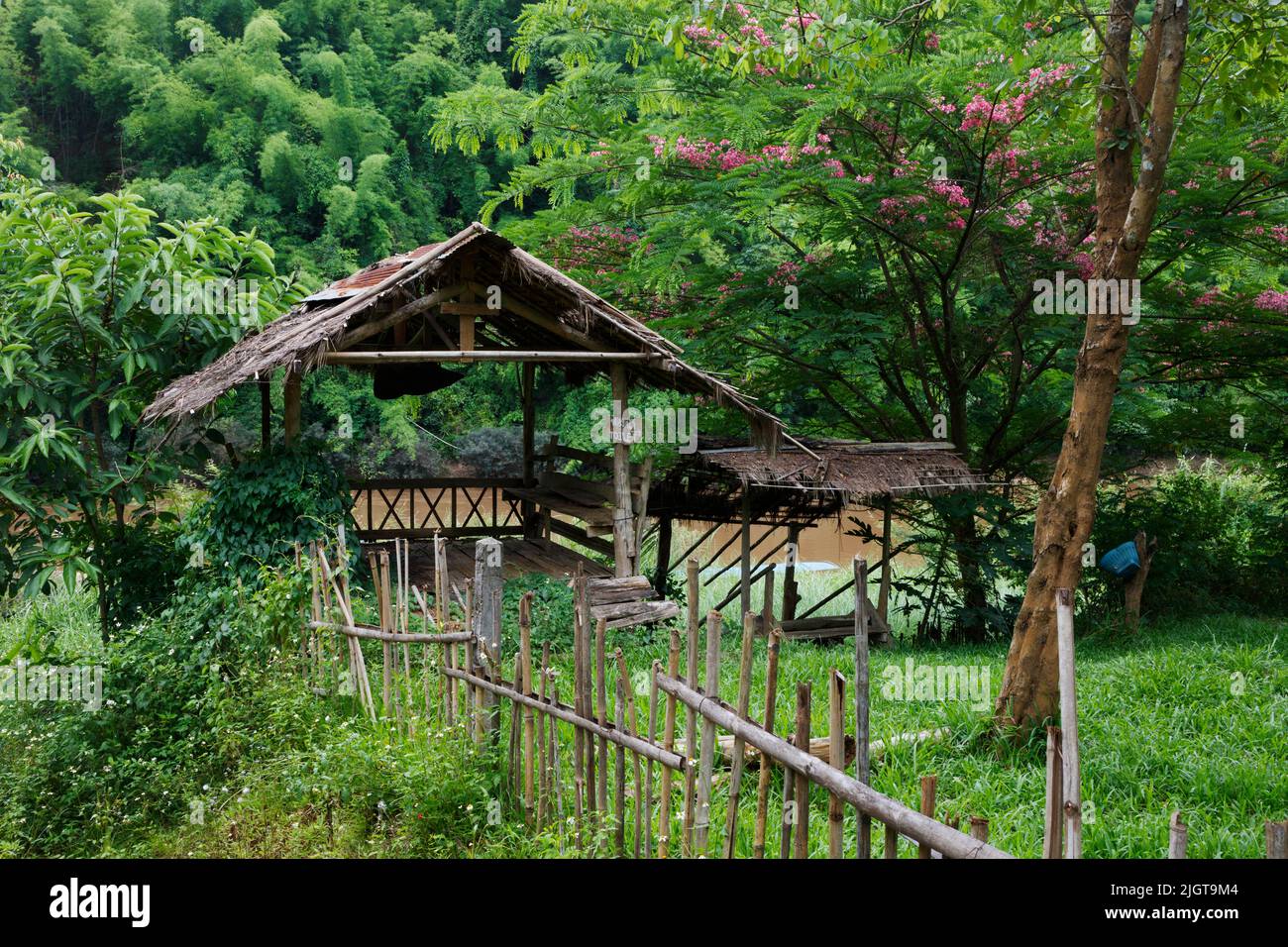 A LIHU village can be visited on a boat trip along the MAE KOK river from Thaton to Chiang Rai  - THAILAND Stock Photo