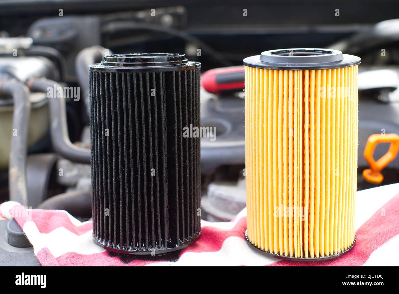 Used and new oil car filter. Car servicing, automotive industry or oil