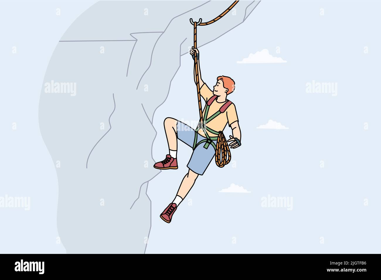 Man climbing mountain with special equipment. Male climber hanging on