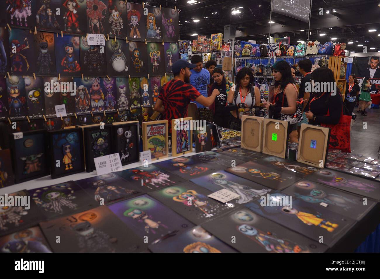 MIAMI BEACH, FL JULY 09 Fans of SUPERCON look over merchandise at the Florida Supercon held
